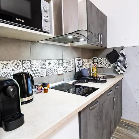 Okbrasov - & In The Heart Of Old Town, Moments Away From The Black Church Apartment